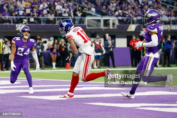 Isaiah Hodgins of the New York Giants catches a touchdown pass during the first quarter against the Minnesota Vikings in the NFC Wild Card playoff...