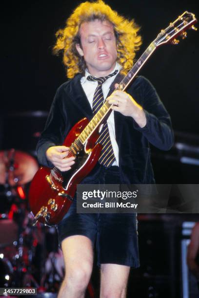 Angus Young of the band AC/DC in concert at The Spectrum in Philadelphia, Pennsylvania