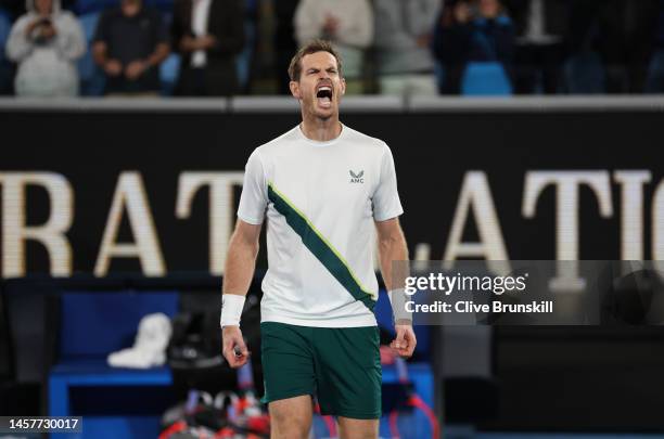 Andy Murray of Great Britain celebrates to the crowd after his five set victory in their round two singles match against Thanasi Kokkinakis of...