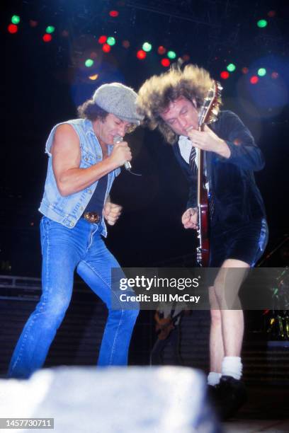 Brian Johnson and Angus Young of the band AC/DC in concert at The Spectrum in Philadelphia, Pennsylvania