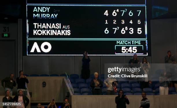 The scoreboard shows the match time of 5 hours and 45 minutes after Andy Murray of Great Britain's five set victory in their round two singles match...