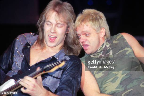 Wolf Hoffman and Mark Tornillo of the band Accept in concert at the Tower Theater in Philadelphia, Pennsylvania