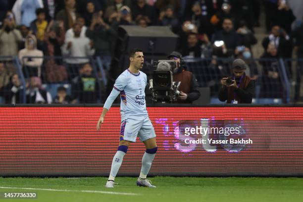 Cristiano Ronaldo of Riyadh XI celebrates after scoring the side's first goal form the penalty spot during the Winter Tour 2023 friendly between...