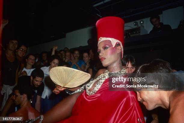 View of Jamaican-born singer and model Grace Jones as she is carried past the audience prior to a performance, New York, New York, June 1, 1977.