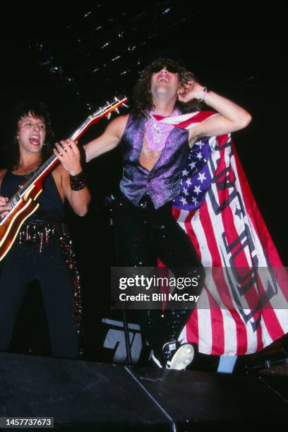 Richie Sambora and Jon Bon Jovi of the band Bon Jovi in concert at The Spectrum in Philadelphia, Pennsylvania