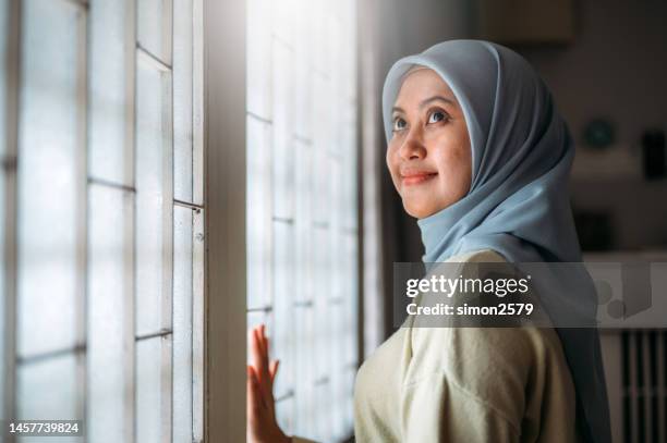 my happy place is right here at home - malaysian people stock pictures, royalty-free photos & images