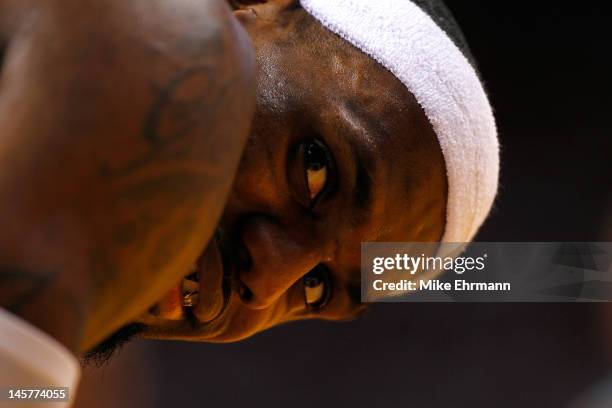 LeBron James of the Miami Heat looks on in the first half against the Boston Celtics in Game Five of the Eastern Conference Finals in the 2012 NBA...