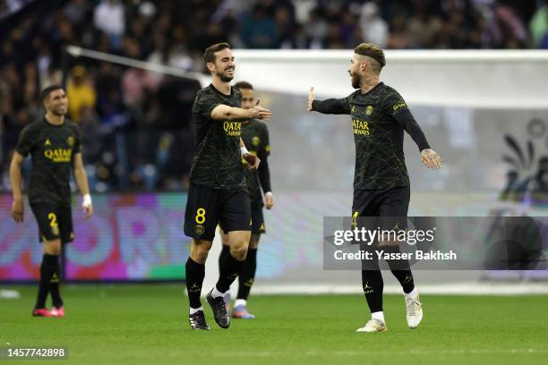 Sergio Ramos of Paris Saint-Germain celebrates with teammate Fabian Ruiz after scoring the side's third goal during the Winter Tour 2023 friendly...