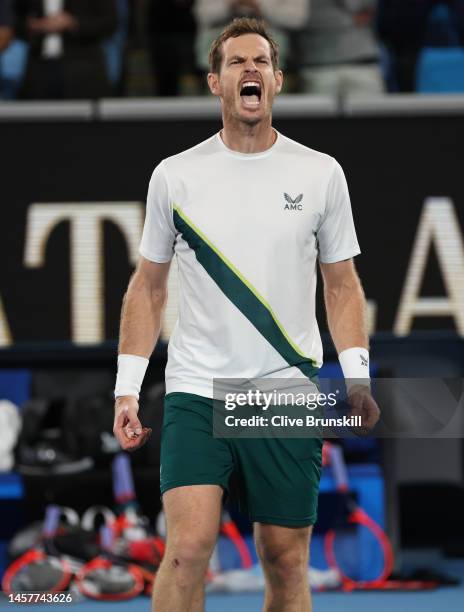 Andy Murray of Great Britain celebrates to the crowd after his five set victory in their round two singles match against Thanasi Kokkinakis of...