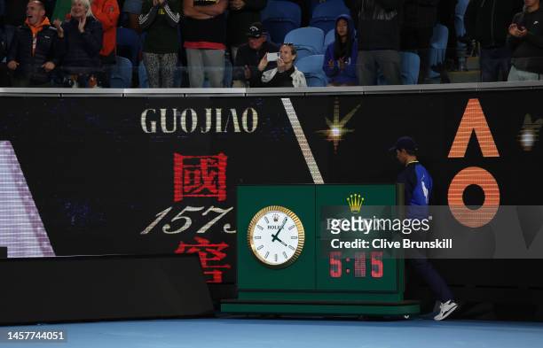 The court clock shows the match time of 5 hours and 45 minutes after Andy Murray of Great Britain's five set victory in their round two singles match...