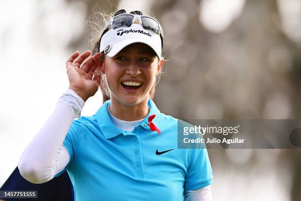 Nelly Korda of the United States reacts after making her putt on the on the 18th hole during the first round of the Hilton Grand Vacations Tournament...