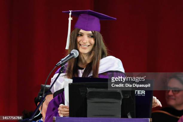 Emily Ratajkowski speaks onstage as she delivers the winter commencement address for Hunter College at Hunter College on January 19, 2023 in New York...