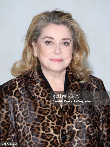 Catherine Deneuve attends the AMI - Alexandre Mattiussi Menswear Fall-Winter 2023-2024 show as part of Paris Fashion Week on January 19, 2023 in...