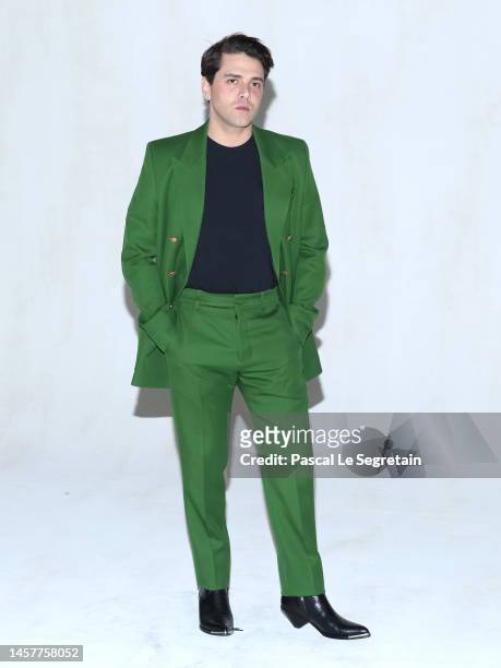 Xavier Dolan attends the AMI - Alexandre Mattiussi Menswear Fall-Winter 2023-2024 show as part of Paris Fashion Week on January 19, 2023 in Paris,...