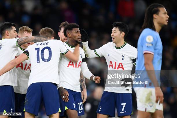 Emerson of Tottenham Hotspur celebrates with team mates after scoring their sides second goal during the Premier League match between Manchester City...