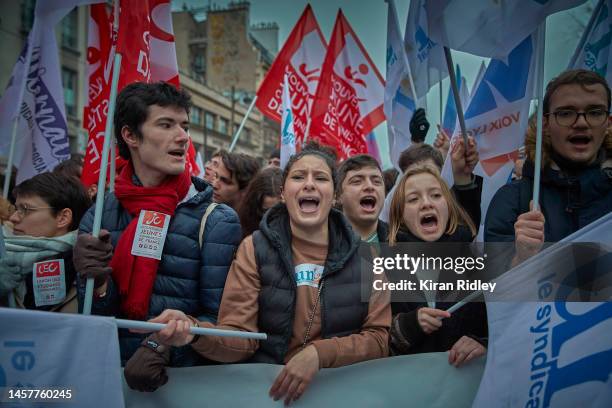 Protesters from the French National Students Union chant as they march through central Paris as over 400,000 people take the streets of the French...