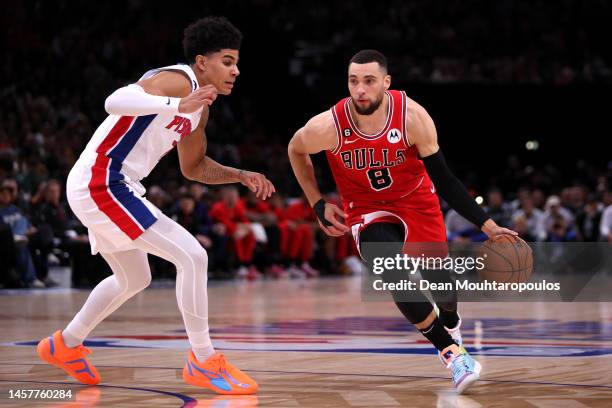 Zach LaVine of the Chicago Bulls dribbles the ball past Killian Hayes of the Detroit Pistons during the first quarter of the NBA match between...