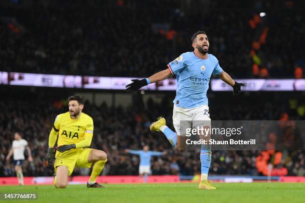 Riyad Mahrez of Manchester City celebrates after scoring their sides fourth goal during the Premier League match between Manchester City and...