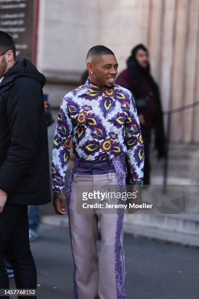 Joe Haden seen wearing a paisley printed long shirt and matching purple pants before the Bluemarble show during Paris Fashion Week Menswear...