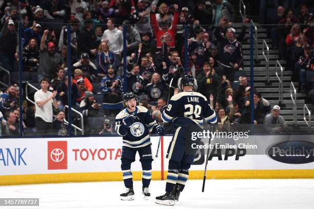 Nick Blankenburg of the Columbus Blue Jackets celebrates his goal with Patrik Laine during the first period against the Anaheim Ducks at Nationwide...