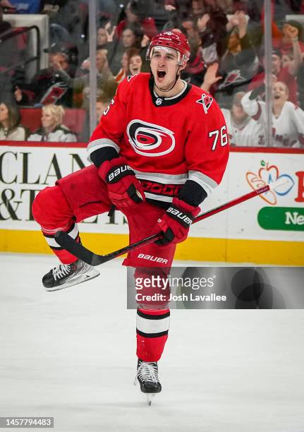 Brady Skjei of the Carolina Hurricanes celebrates after scoring a goal during the second period against the Minnesota Wild at PNC Arena on January...