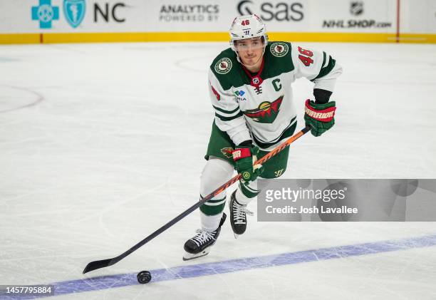 Jared Spurgeon of the Minnesota Wild skates during the second period against the Carolina Hurricanes at PNC Arena on January 19, 2023 in Raleigh,...