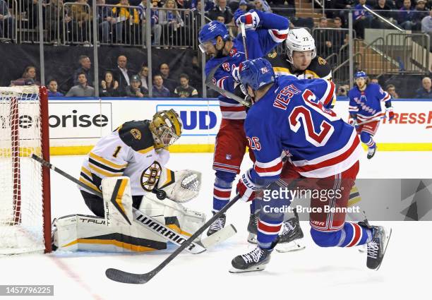 Jeremy Swayman of the Boston Bruins makes the second period save on Jimmy Vesey of the New York Rangers at Madison Square Garden on January 19, 2023...