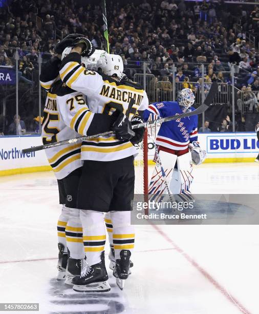 Connor Clifton of the Boston Bruins celebrates his third period goal on an assist from Brad Marchand against the New York Rangers at Madison Square...