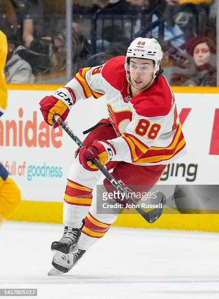 Andrew Mangiapane of the Calgary Flames skates against the Nashville Predators during an NHL game at Bridgestone Arena on January 16, 2023 in...