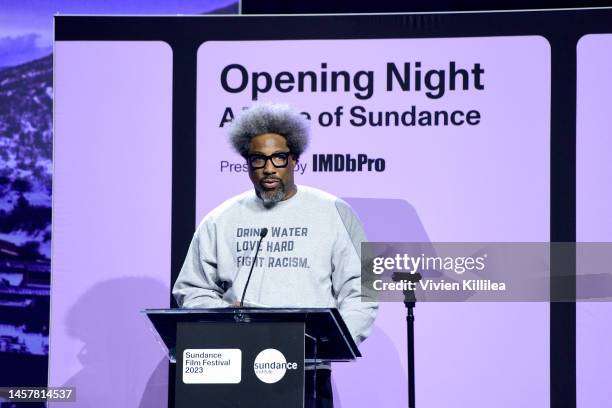 Kamau Bell accepts an award onstage during Sundance Institute's 'Opening Night: A Taste of Sundance Presented by IMDbPro' at the 2023 Sundance Film...