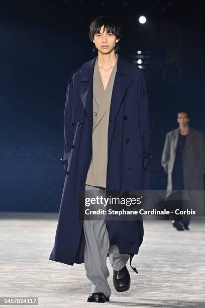 Model walks the runway during the AMI - Alexandre Mattiussi Menswear Fall-Winter 2023-2024 show as part of Paris Fashion Week on January 19, 2023 in...