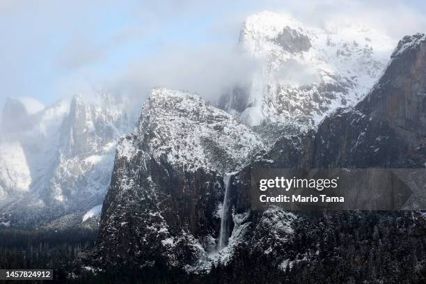 Water flows from Bridalveil Fall in Yosemite Valley, after the last of a series of atmospheric river storms passed through, on January 19, 2023 in...