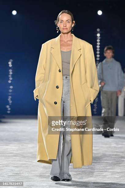 Amber Valletta walks the runway during the AMI - Alexandre Mattiussi Menswear Fall-Winter 2023-2024 show as part of Paris Fashion Week on January 19,...