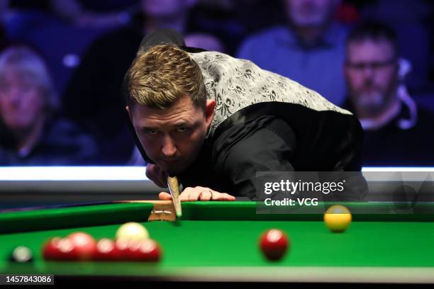 Kyren Wilson of England plays a shot during the second round match against Shaun Murphy of England on day four of the 2023 Duelbits World Grand Prix...