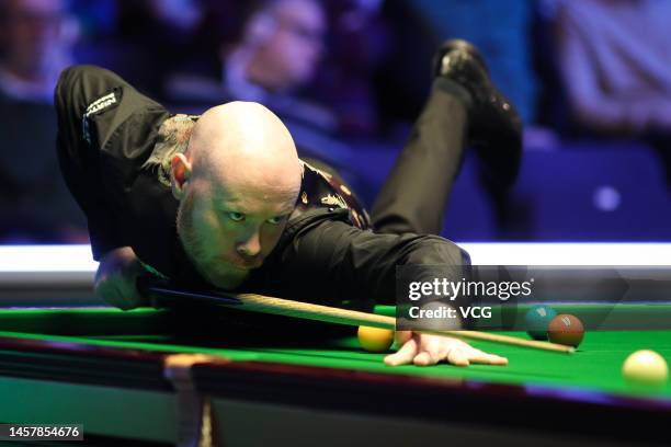 Anthony McGill of Scotland plays a shot during the first round match against Gary Wilson of England on day three of the 2023 Duelbits World Grand...