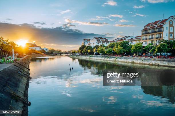 hoi an ancient town, sunset over the river - danang stock pictures, royalty-free photos & images