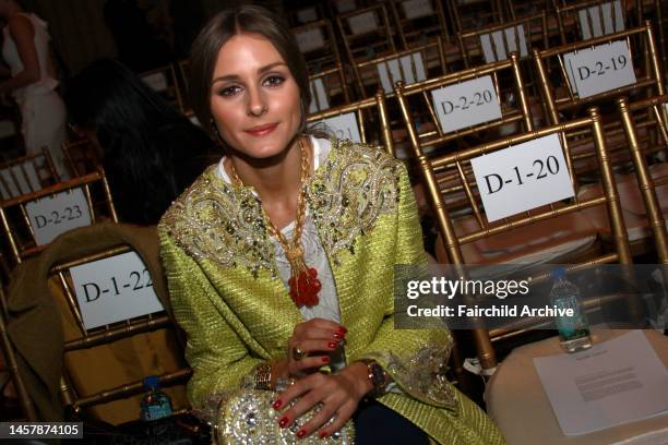 Olivia Palermo attends Marchesa's fall 2013 runway show in Celeste Bartos Forum at the New York Public Library.