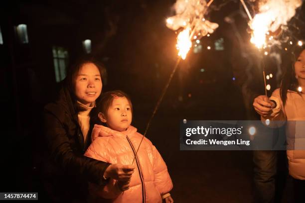 Family Setting Off Fireworks Photos and Premium High Res Pictures ...