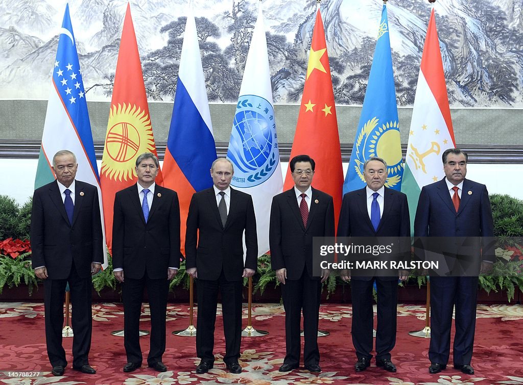 (L-R) Uzbekistan's President Islam Karim