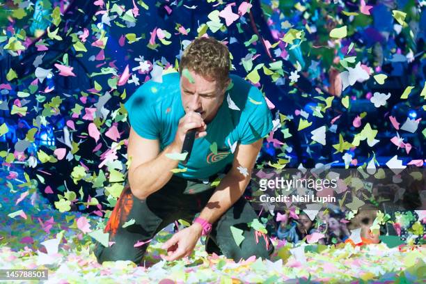 Chris Martin of Coldplay performs on stage at Emirates Stadium on June 1, 2012 in London, United Kingdom.