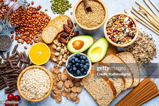 group of food with high content of dietary fiber shot from above - fibre stockfoto's en -beelden