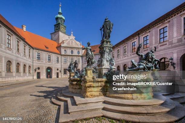 fountain in the fountain courtyard of the munich residenz. munich, upper bavaria, bavaria, germany - munich residenz stock pictures, royalty-free photos & images