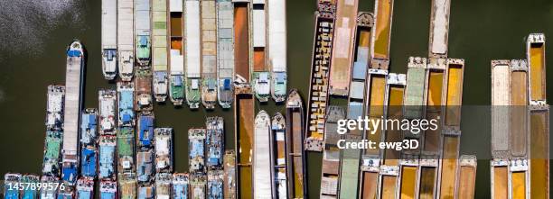 empty barges moored on the canal - stettin stockfoto's en -beelden