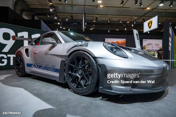 Porsche 911 GT3 RS sports car on display at Brussels Expo on January 13, 2023 in Brussels, Belgium. The GT3 RS is a lightweight more powerful version...