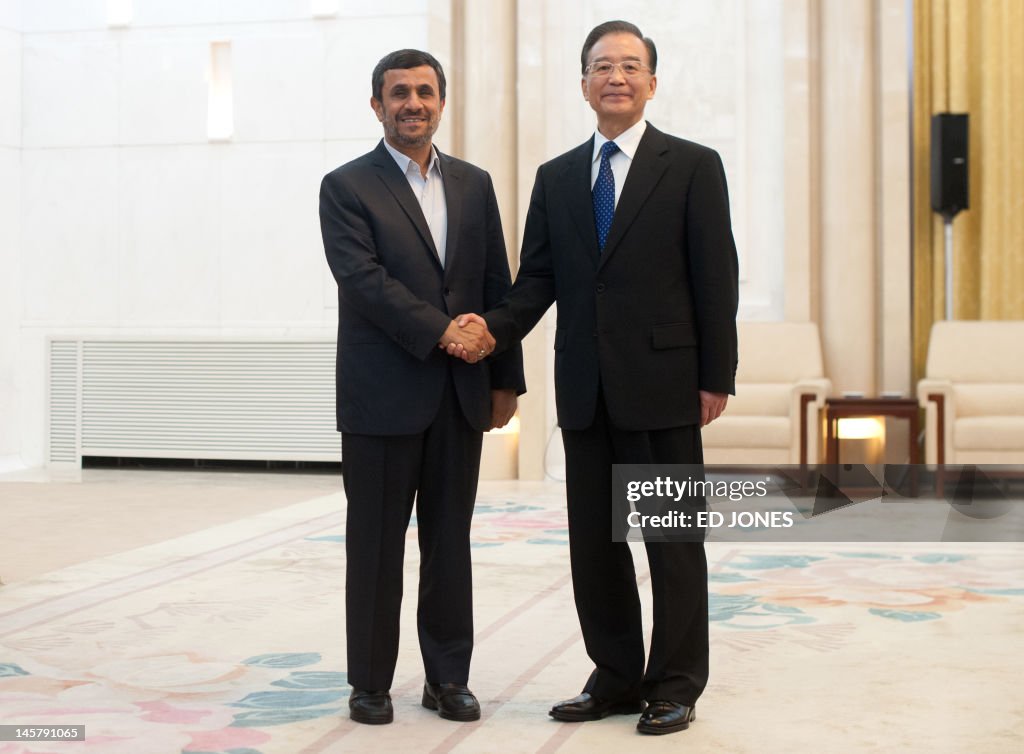 Iran's President Mahmoud Ahmadinejad (L)