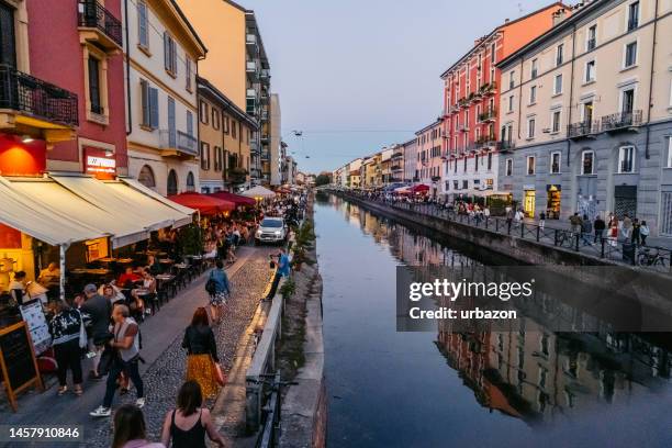 navigli canal in milan at dawn - milan navigli stock pictures, royalty-free photos & images