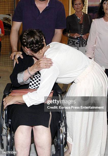 Maria Esteve and her grandmother attend her picture exhibition 'De Malaga Al Cielo' on May 16, 2012 in Malaga, Spain.