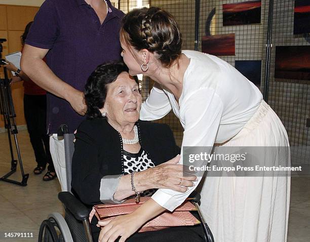 Maria Esteve and her grandmother attend her picture exhibition 'De Malaga Al Cielo' on May 16, 2012 in Malaga, Spain.