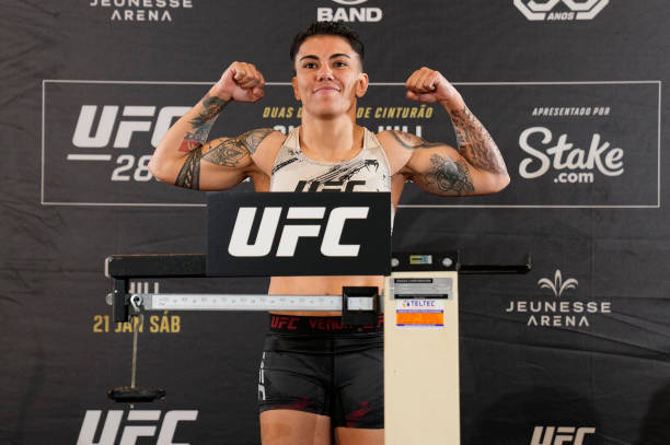 Jailton Almeida of Brazil poses on the scale during the UFC 283 official weigh-in at the Windsor Marapendi Hotel on January 20, 2023 in Rio de...