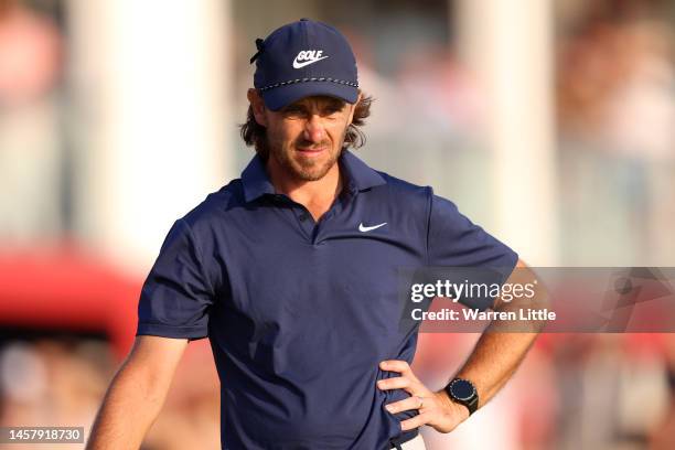 Tommy Fleetwood of England looks on from the eighteenth green during day two of the Abu Dhabi HSBC Championship at Yas Links Golf Course on January...